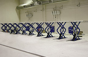 Scissor lifts installed in multi service bay workshop