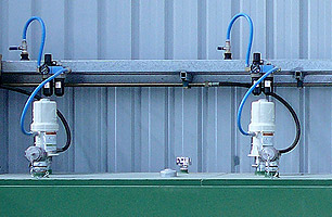Oil and grease pumps connected to main lubrication supply tanks and high pressure lines