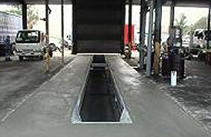 Lay formwork on pit floor for concreting, pour concrete to form the new finished floor. Weld in top deck steel work and paint pit in two pack epoxy. Pit jacks plumbed to external power