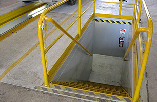 Safety hand rail installed in Bus workshop for prefabricated drop-in pit with stairs with tunnel